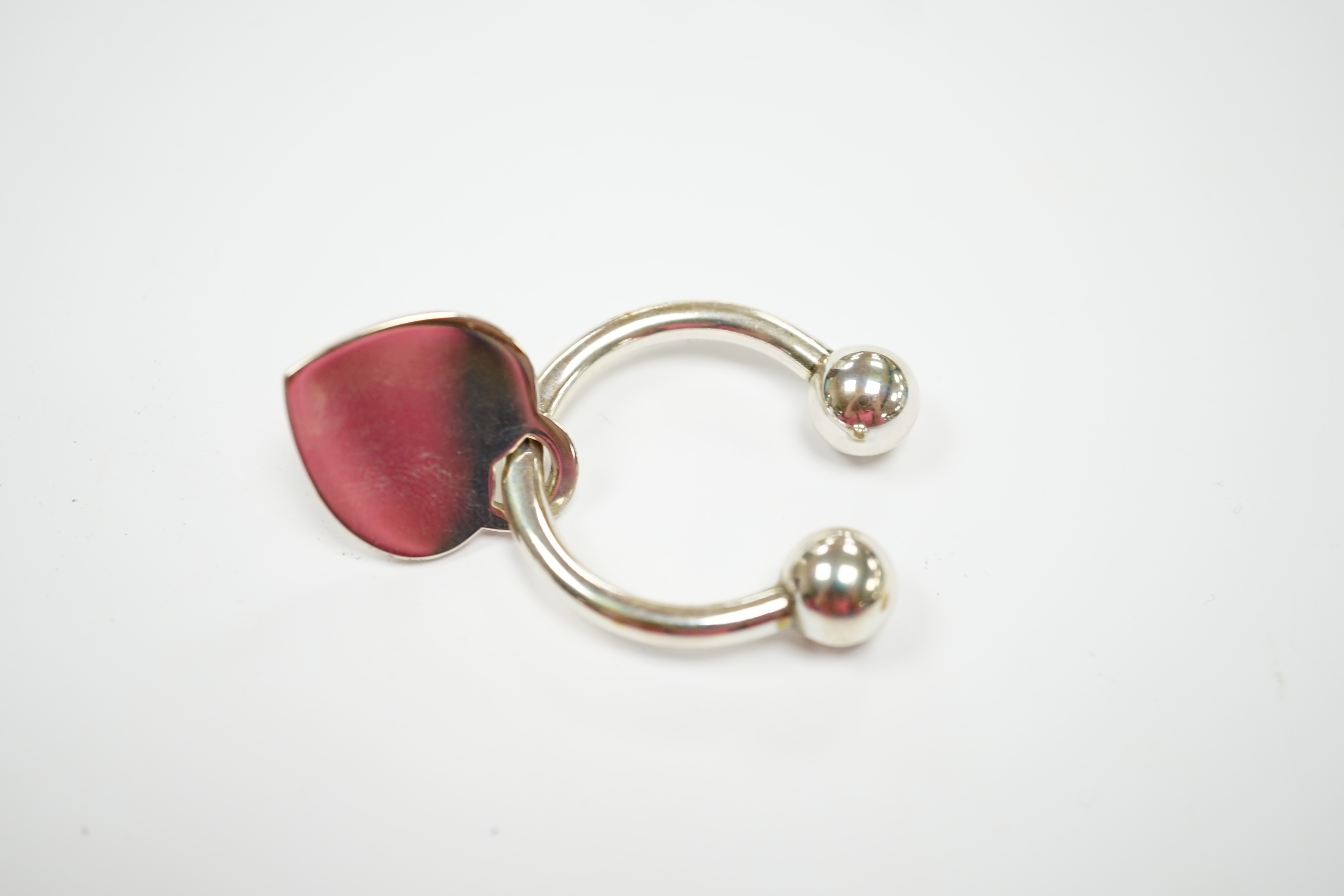 A modern Tiffany & Co 925 keyring, width 31mm, with box and papers.